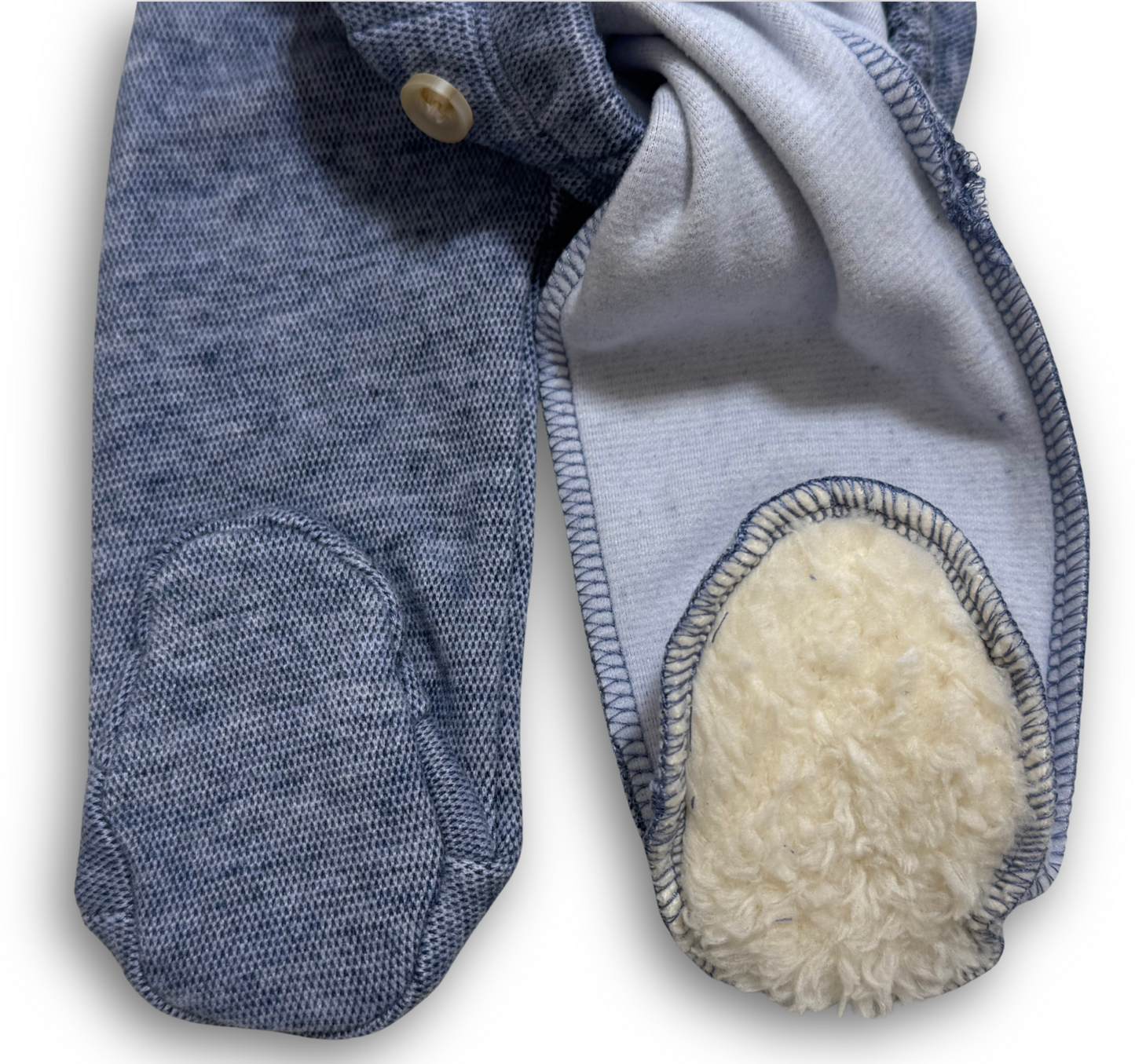 Blue slipper with white interior on a white background