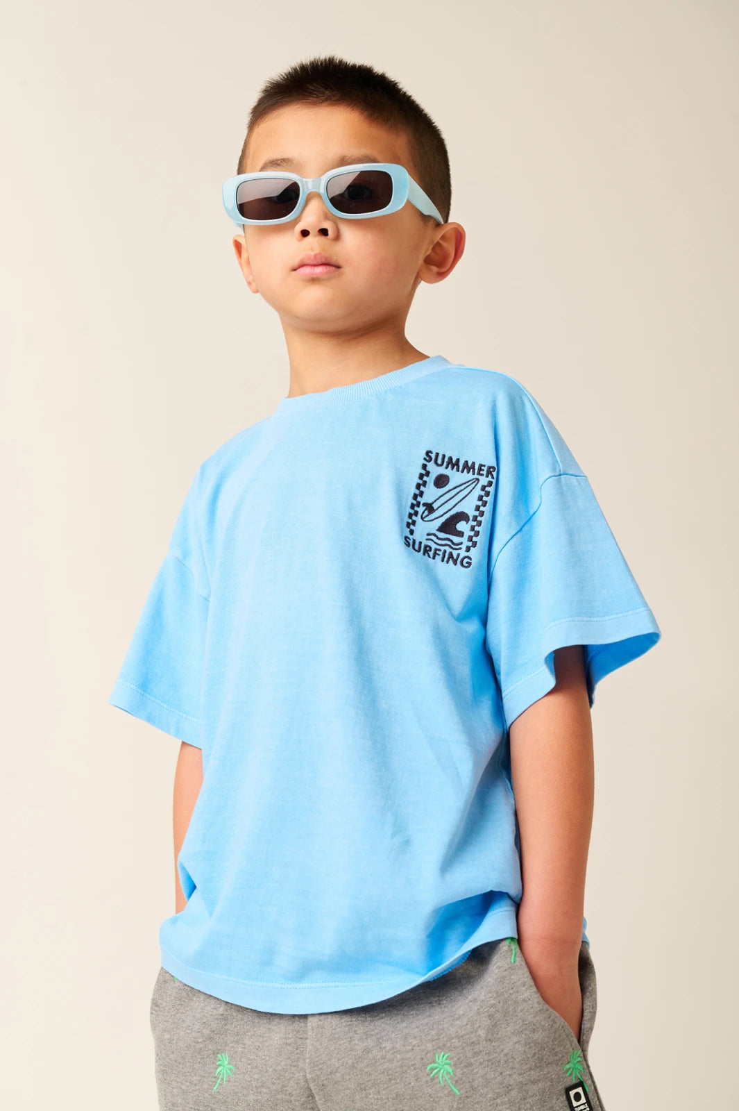 Samoa Embroidered "Surfing" Short Sleeve Tee